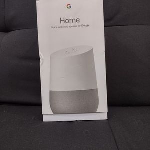 Google Home Voice-Activated speaker by Google